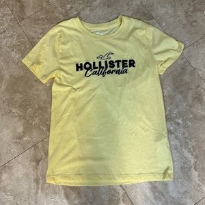 A new without tags light yellow Hollister T-shirt